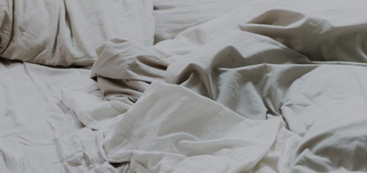 white pillows and bed comforter